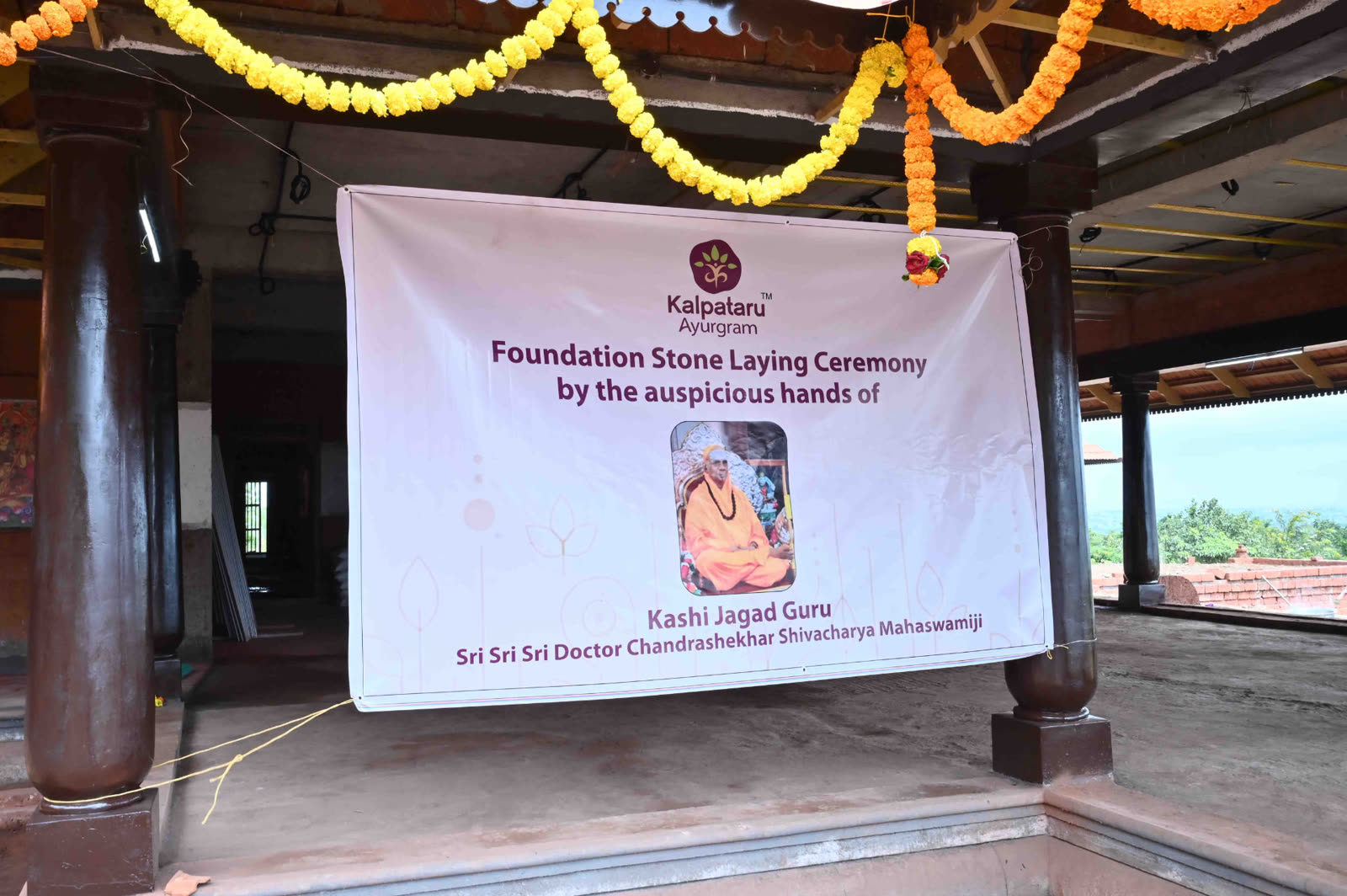 Foundation stone laying ceremony banner — Kalpataru Ayurgram